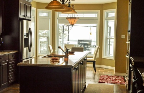 Janetville House | Scenic Waterfront Lake House with Pool & Family Amenities