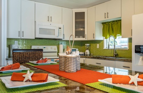 Key Largo Village House | Incredible Water Front Home with Sunset Views & Private Pool
