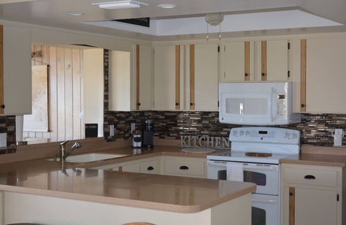 Edgewater House | Experience Water's Edge: Waterfront Home with Spa & Ocean View