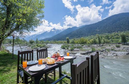 Gund Villa | Pet-Friendly StayVista at Water's Edge with River Views