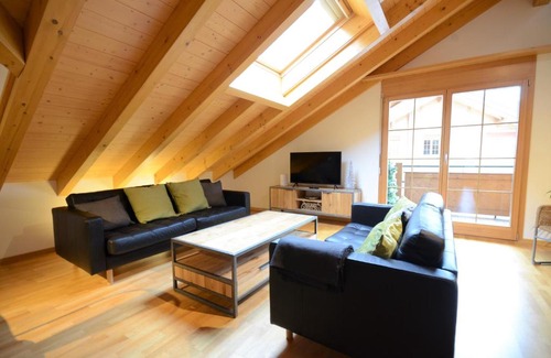 Lauterbrunnen Apartment | Relaxing Waterfall View Penthouse with 10/10 Guest Rating