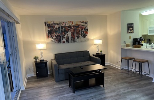Harbor Beach Apartment | WaterFront 1BR Retreat with Pool, Steps from the Beach