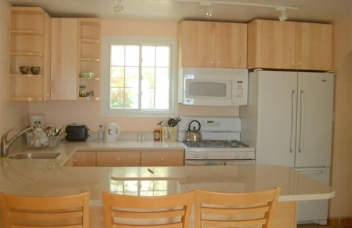 Somerset Village Cottage | Waterfront 2 Bedroom Cottage with Private Beach Access