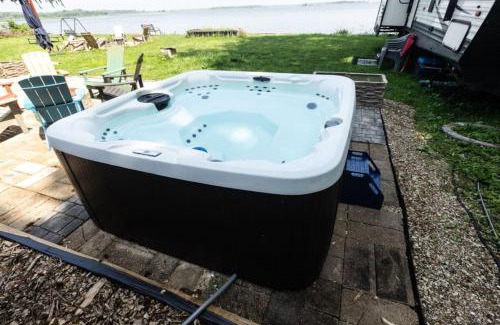 Spring Grove House | Waterfront 2BR Nautical Cottage on Grass Lake Hot Tub, Firepit, Year Round Fun