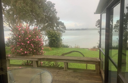 Glenbrook House | Peaceful Waterfront Retreat with Spa and Sunny Conservatory