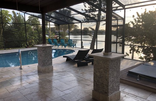 Bay Port Colony House | Elegant Waterfront 4 Bedroom Home with Private Pool & Spa