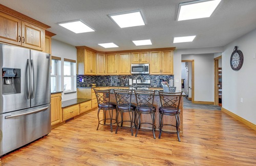 Bay City House | Waterfront Bay City Retreat with Dock & Spa Amenities