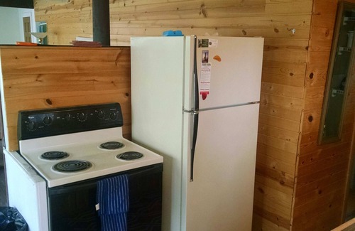 Mears Cottage | Scenic Waterfront Cabin: Canoeing to the Sand Dunes