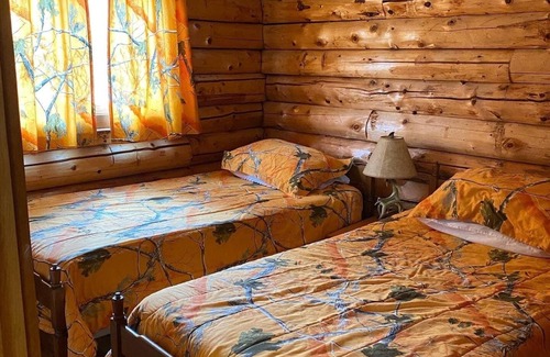 Crystal Falls Resort | Serene Waterfront Cabin on the Paint River - Rated 9.6/10!