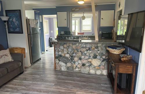 Elk Rapids Cottage | Charming Waterfront Cottage with Lake View and Biking Trails