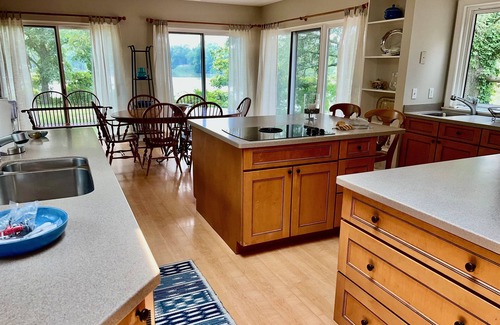 Easton House | Waterfront Oasis: Dock, Pool & Top-Rated Amenities Await