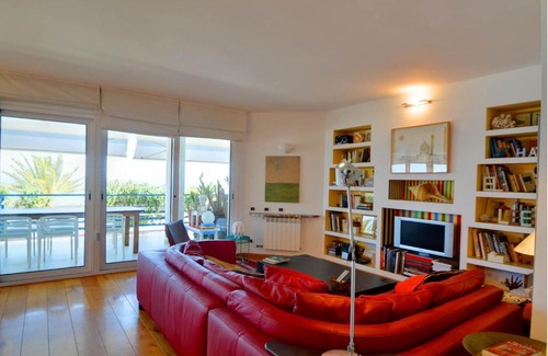 Passeig Maritim Apartment | Waterfront Duplex with Ocean View & Pool in Sitges