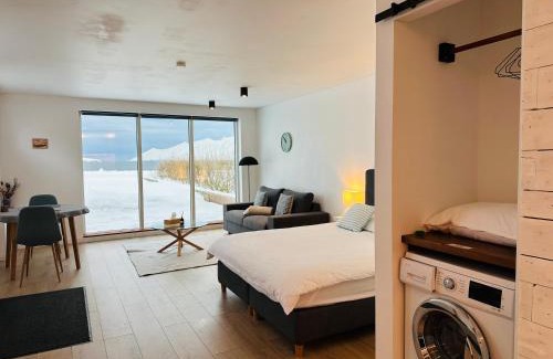 Hauganes House | Oceanfront Waterfront Fjord House with Perfect 10 Rating