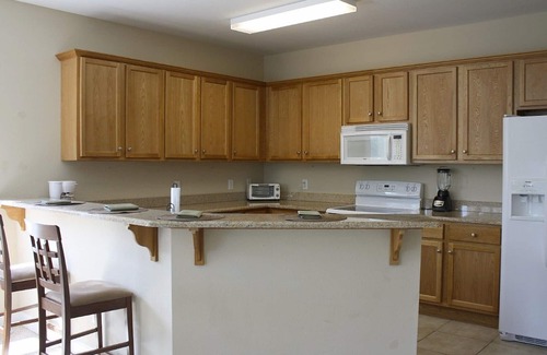 Foley Condo | Waterfront Retreat: Fishing, Pool Access & Close to Outlets