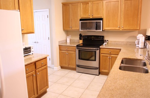 Foley Condo | Tranquil Waterfront Retreat: Fishing, Pool & Close to Outlets