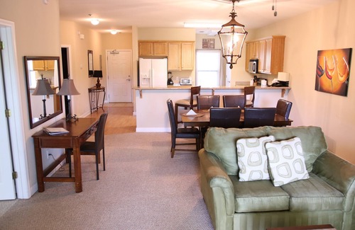 Foley Condo | Tranquil Waterfront Retreat: Fishing, Pool & Close to Outlets