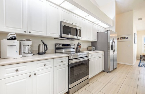White Marsh House | Unmatched Waterfront Haven with Pool and Spa Amenities