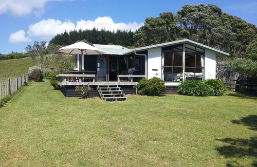 Opito Bay House | Waterfront Holiday Home: Family-Friendly Retreat with Pool