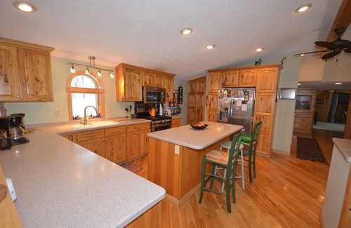 Interlochen House | Tranquil Waterfront Retreat in Lake Ann with Pool & Pets