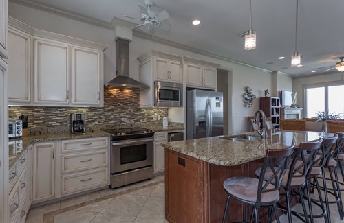 Villa Primera House | Waterfront Retreat with Heated Pool & Steps to Dining