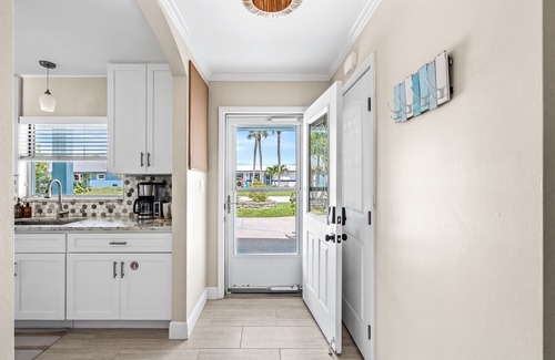 Convair Cove House | Experience Canal Home: Walk to Beach with Pool & Spa