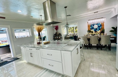 Rainbow Groves House | Waterfront Retreat with Heated Pool, Jacuzzi & Private Dock