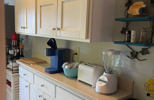 North Shore Condo | Inviting Waterfront Retreat: Family-Friendly with Pool & Breakfast