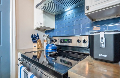 Barataria House | Waterfront King Suite with Hot Tub & Pet-Friendly Access