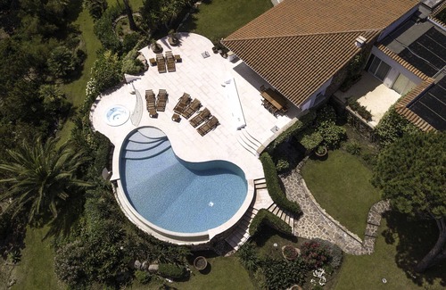 San Teodoro Villa | Scenic Waterfront Retreat with Beach Access and Ocean Views