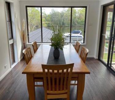 Dora Creek House | Waterfront Entertainer Home with Hot Tub & Family Fun