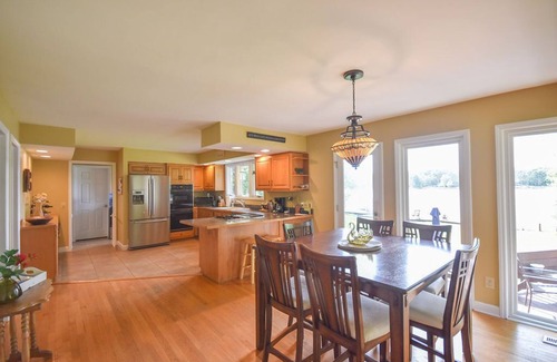 Olivia House | Idyllic Lakefront Retreat with Pool and Ocean Views