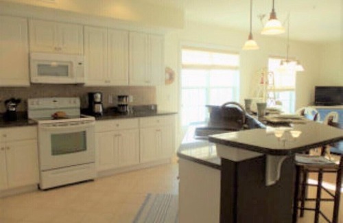 Chincoteague Condo | Waterfront Serenity with Pool & Breakfast for Unforgettable Stays