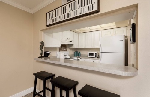 Belle Vista Condo | Waterfront Retreat Steps from the Beach with Great Amenities