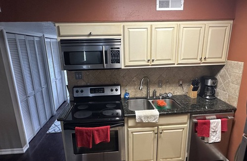 Port Arthur Condo | Relaxing Waterfront Condo with Pool and Pet-Friendly Perks