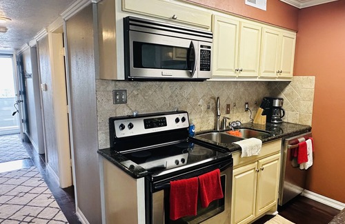 Port Arthur Condo | Relaxing Waterfront Condo with Pool and Pet-Friendly Perks