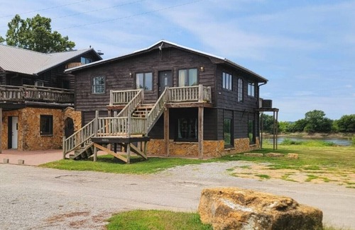 St. Joseph Cabin | Eco-Friendly Waterfront Sunset Cabin Princess Suite Awaits