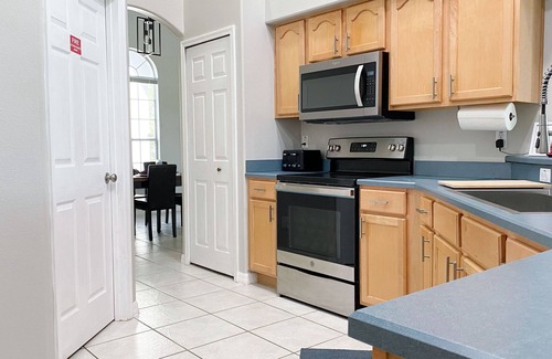 Orange Tree Villa | Tranquil Waterfront Villa with Pool & Games Room – 9.8 Rated