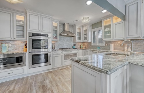 Beach Haven West House | Waterfront Retreat with Dock, Hot Tub & Beach Access