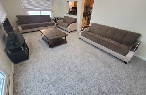 Wyandotte House | Waterfront with boat dock 3-bedroom house on Detroit River canal. Good for 8