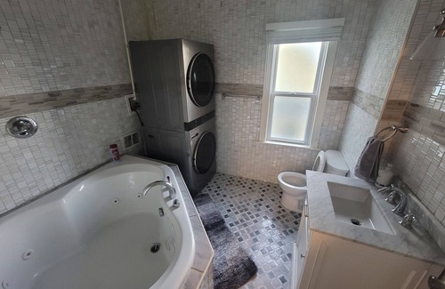 Wyandotte House | Waterfront with boat dock 3-bedroom house on Detroit River canal. Good for 8