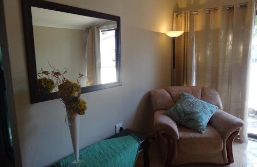Rustenburg Cabin | Discover Waterglen Guest Lodge: Poolside Family Retreat
