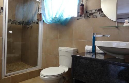 Rustenburg Cabin | Discover Waterglen Guest Lodge: Poolside Family Retreat