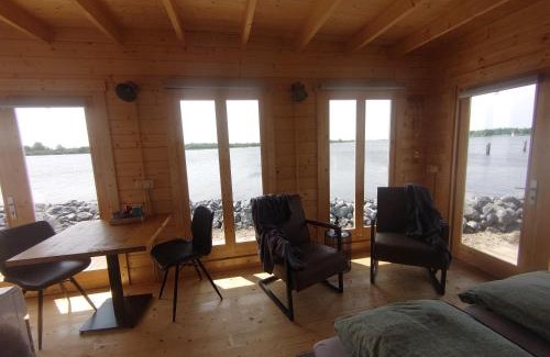 Lauwersoog House | Discover Waterhuisjes: Family-Approved at Lauwersmeer!