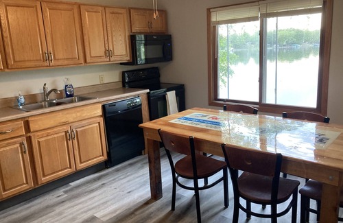 Richwood Cabin | Waters Edge: Year-Round 4-Bedroom Lakehome with Beach Access