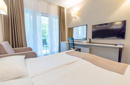 Darlowko Resort | Tranquil Waterside Resort with Oceanfront Pool Access