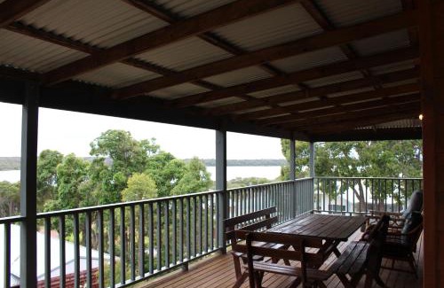 Augusta House | Waterside View: Oceanfront Bliss with 9.7/10 Guest Rating