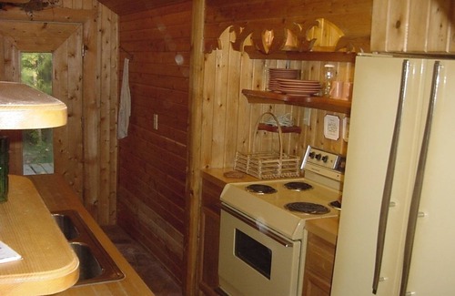 Cheboygan Cottage | Waterway Cottage: Ideal Retreat with Lake Views & Pool