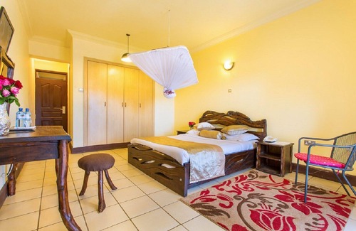 Ruiru House | Urban Escape: Where Nature Meets City Comfort