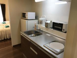 Ojana Apartment | Family-Friendly Weekly Harbourview Mansion in Ginowan