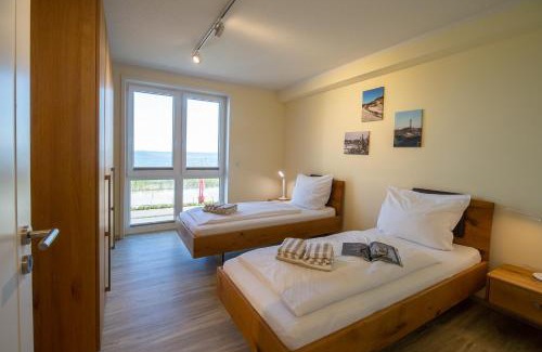 Wittduen Apartment | Accessible Retreat at Weiße Düne Ferienwohnung